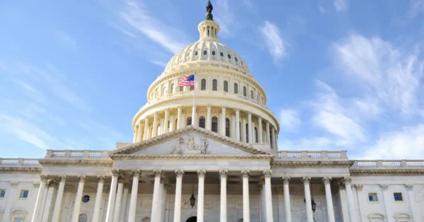 United States Congress Building, with blue sky and clouds in background. This it to represent that the extender bill comes from congress yearly.