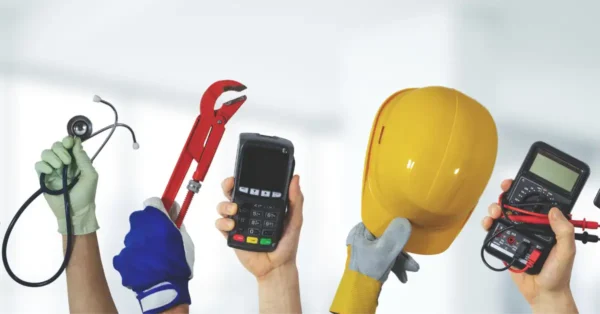 The hands of people in various careers, including a doctor, plumber, engineer, construction and electrician. This image represents the changes for 2024 to employer-sponsored retirement plans as part of the Secure Act 2.0.